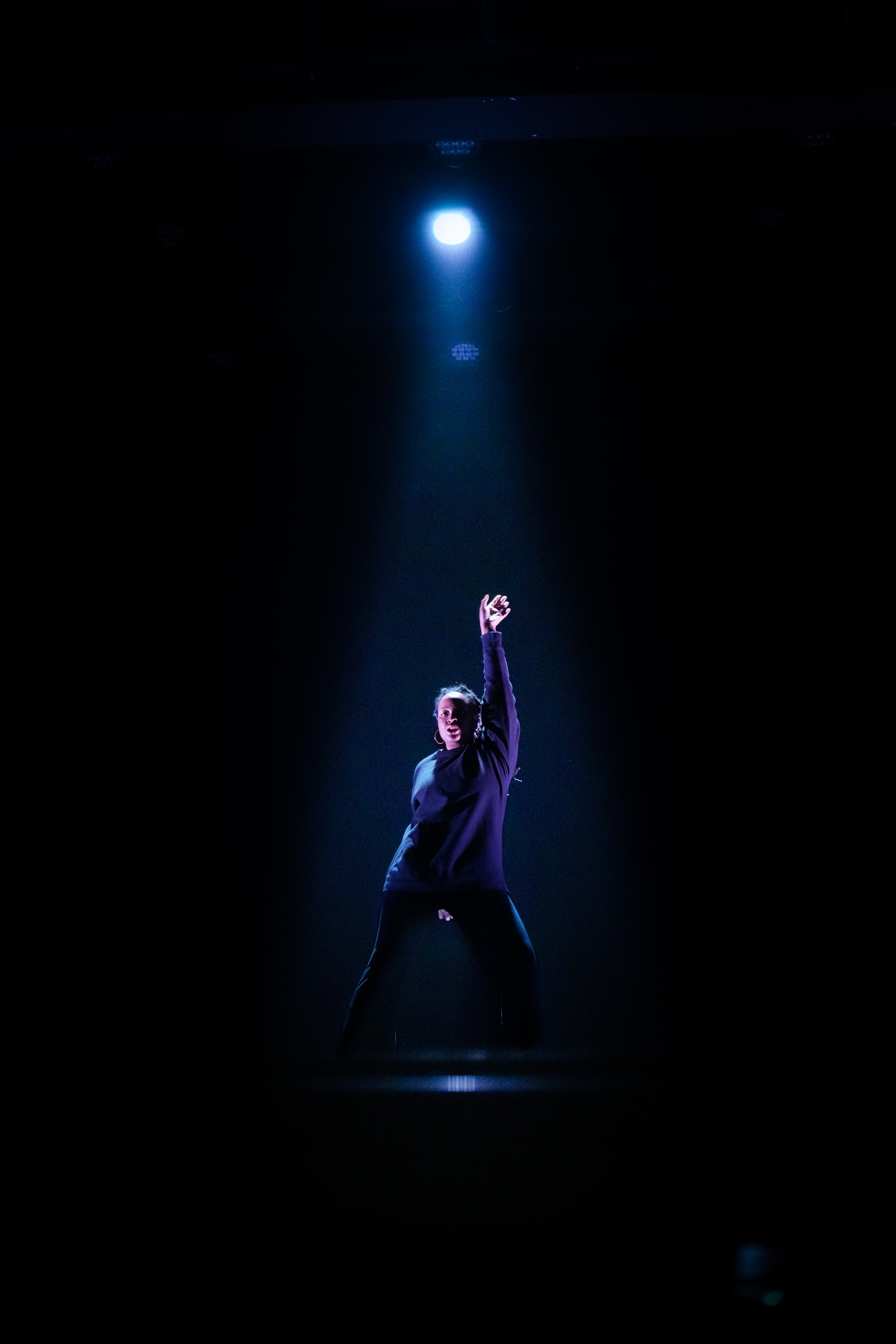 solo dancer in spotlight